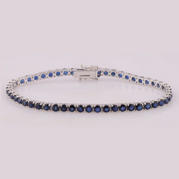 Bracelet en or blanc avec des saphirs bleu
