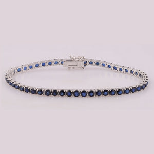 Bracelet en or blanc avec des saphirs bleu